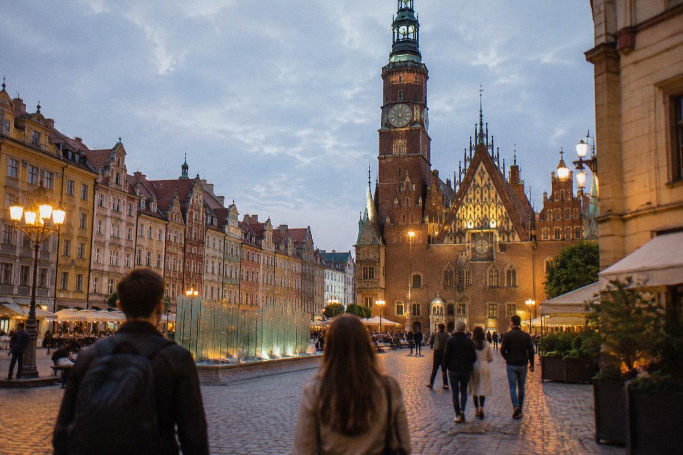 Illuminated historic buildings on a Wroclaw square on a warm evening