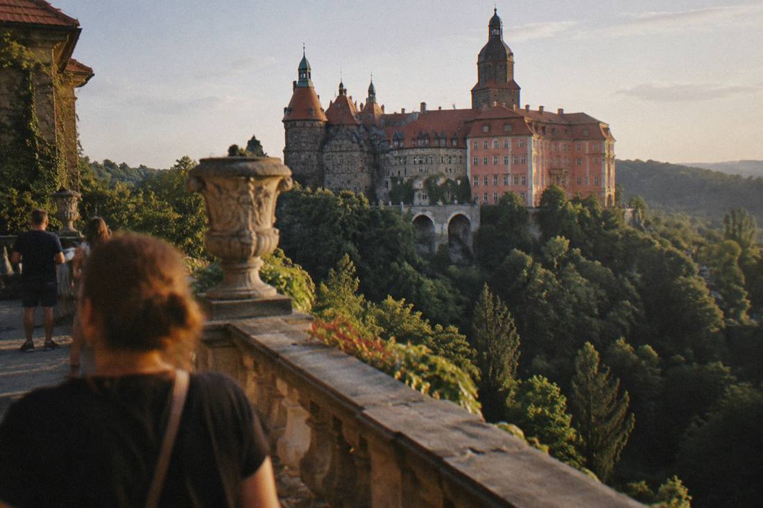 Ksiaz Castle above its forested valley in Lower Silesia, seen from the terraces