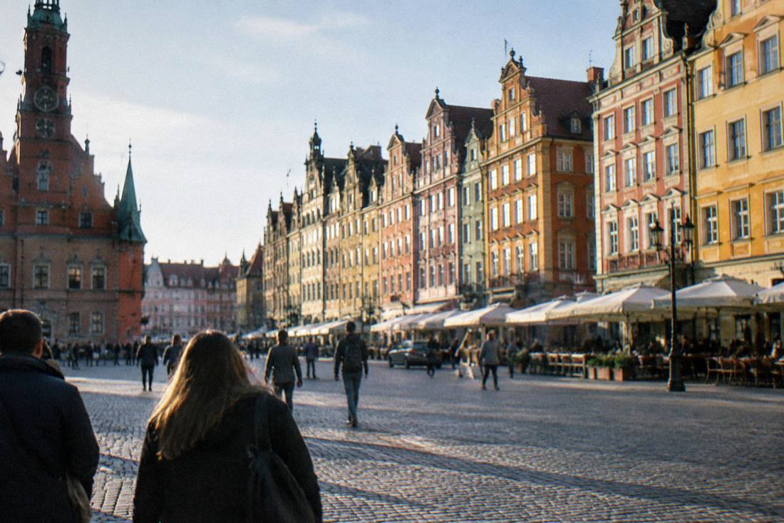 The colorful facades of Wroclaw's Market Square seen from the square floor