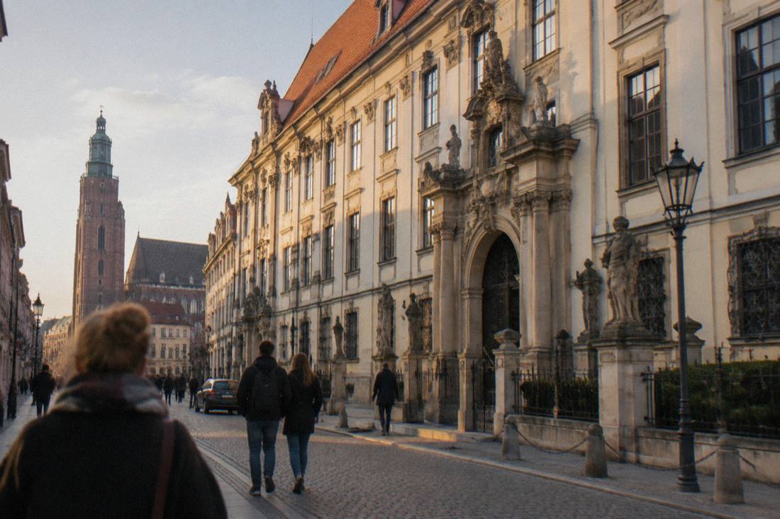 The facade of a historic university building on a street in Wroclaw's Old Town