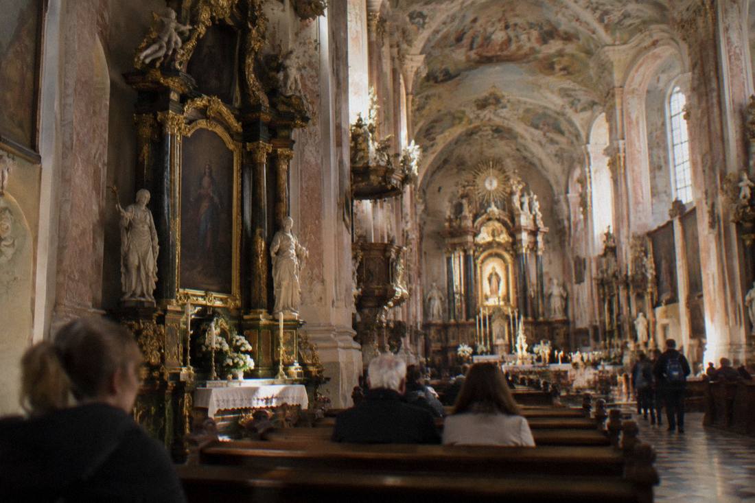 Interior of the Wambierzyce basilica with baroque altars, columns and painted decoration