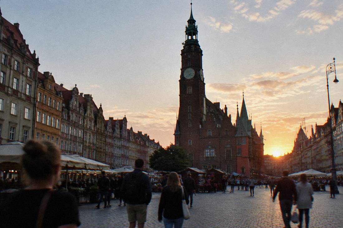The Old Town Hall tower in Wroclaw silhouetted against an evening sky