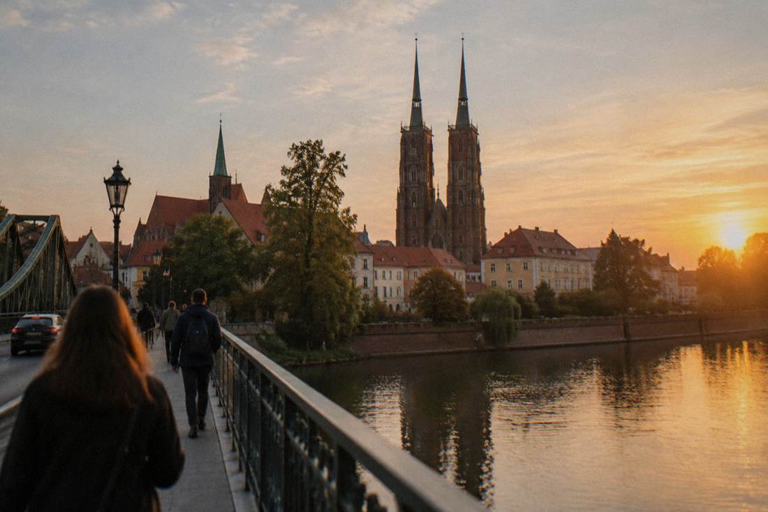 The twin spires of the cathedral on Ostrow Tumski seen from a bridge over the Odra river