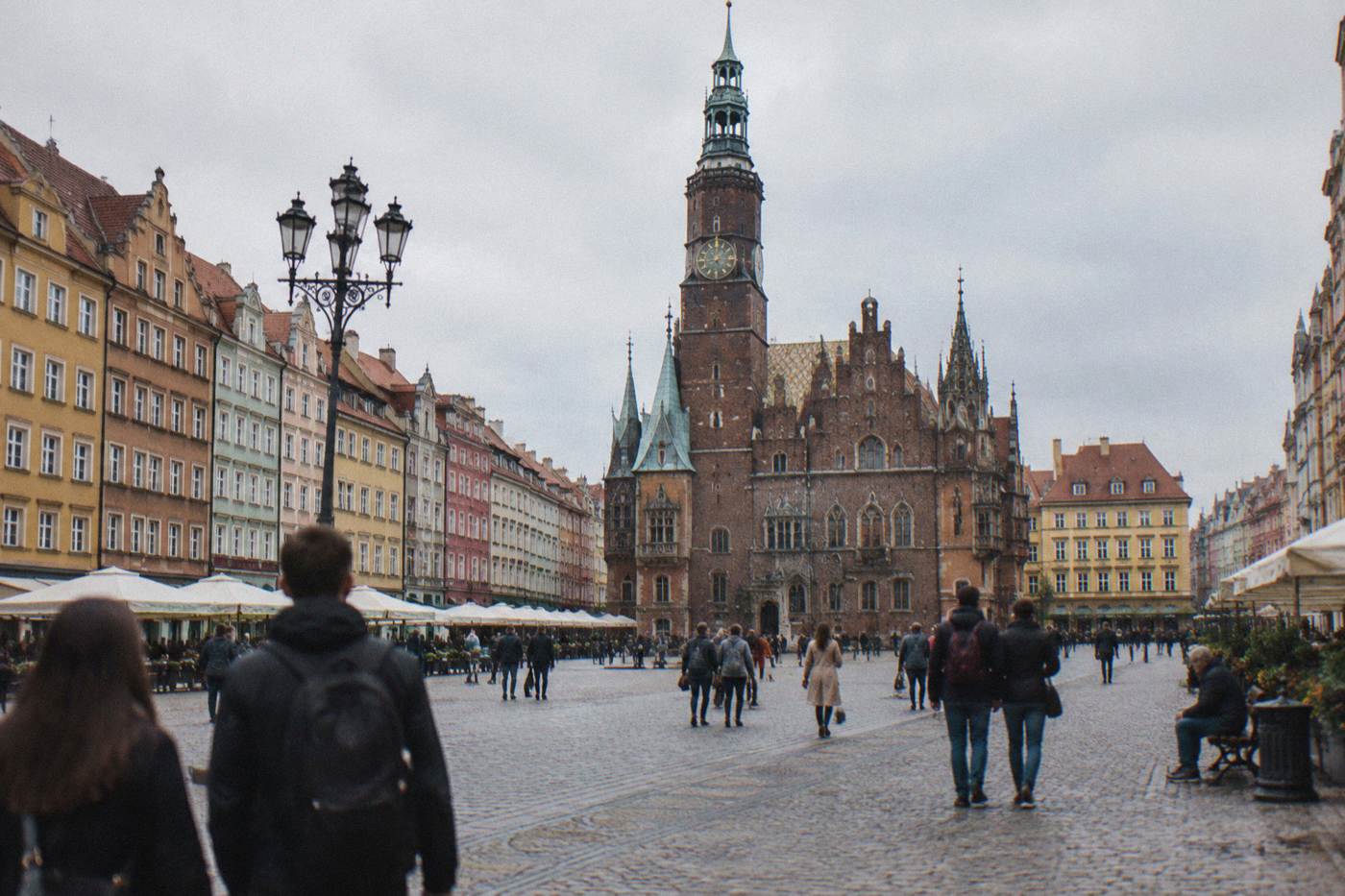 Wide view of Wroclaw Market Square with the Gothic town hall and colorful townhouses