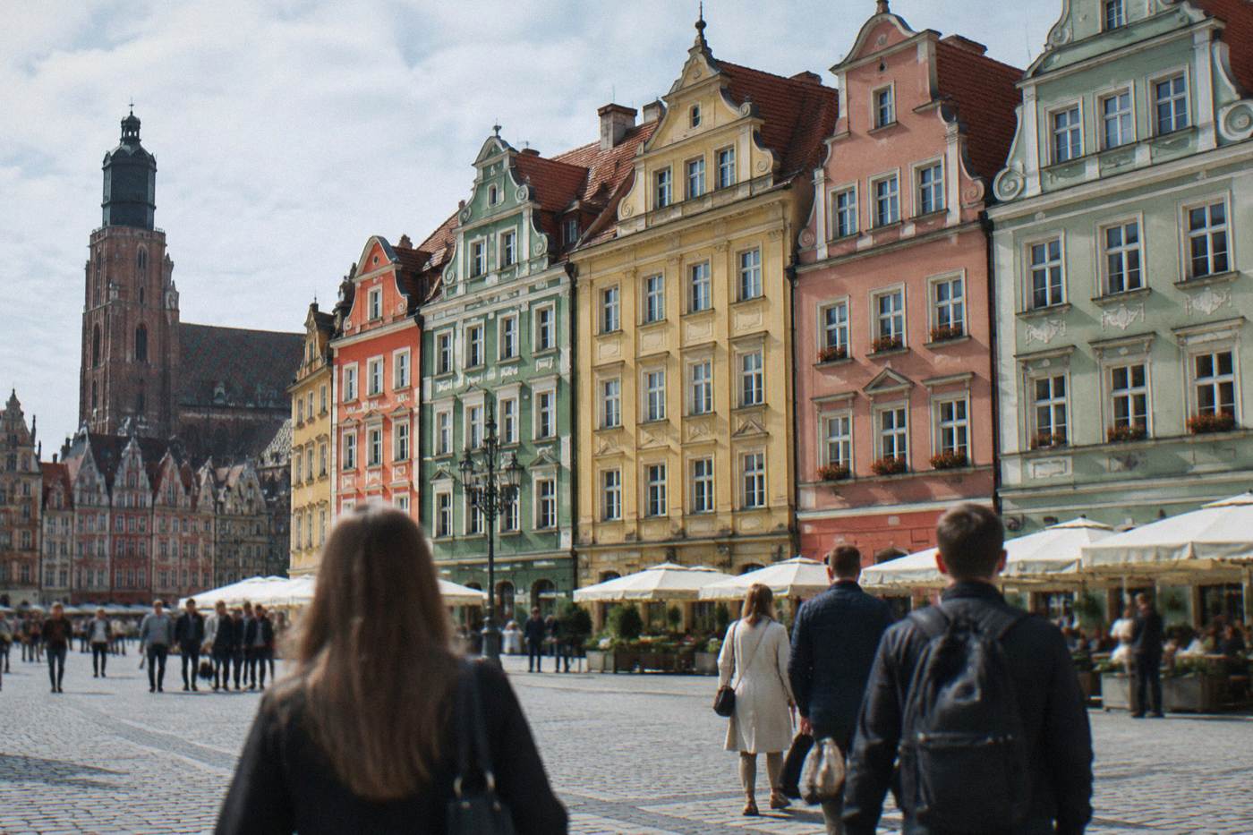 The painted townhouses of Wroclaw Market Square on a bright day