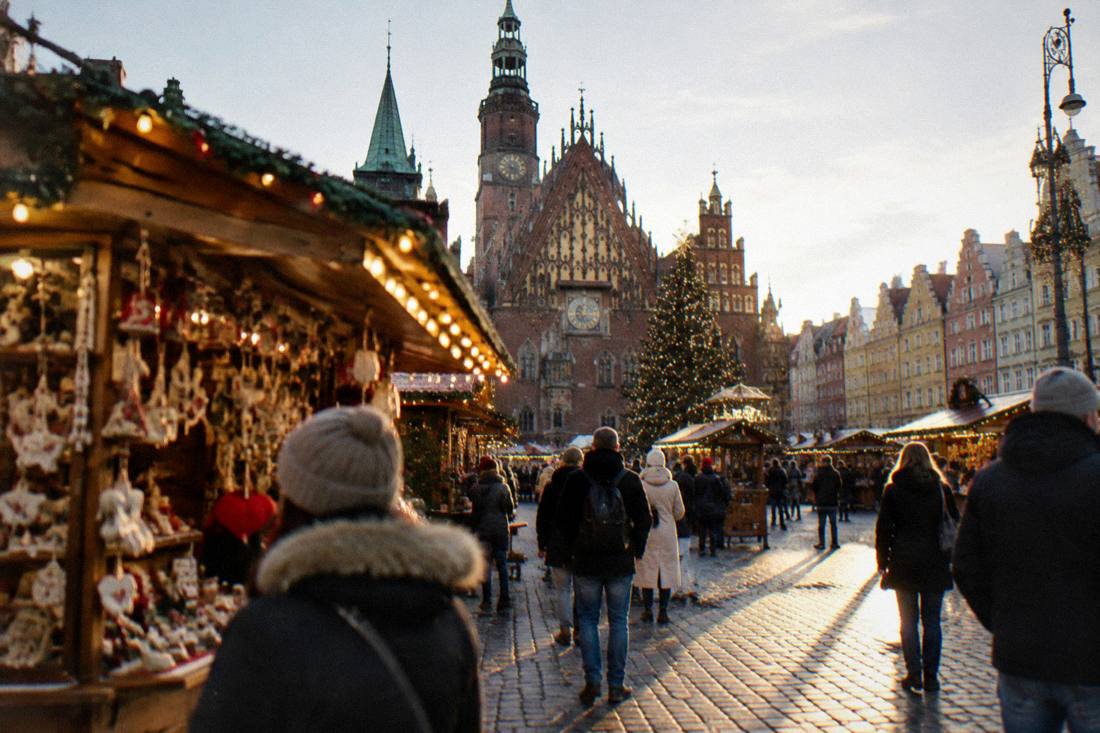 A Christmas market stall with lights on the Wroclaw Market Square in December