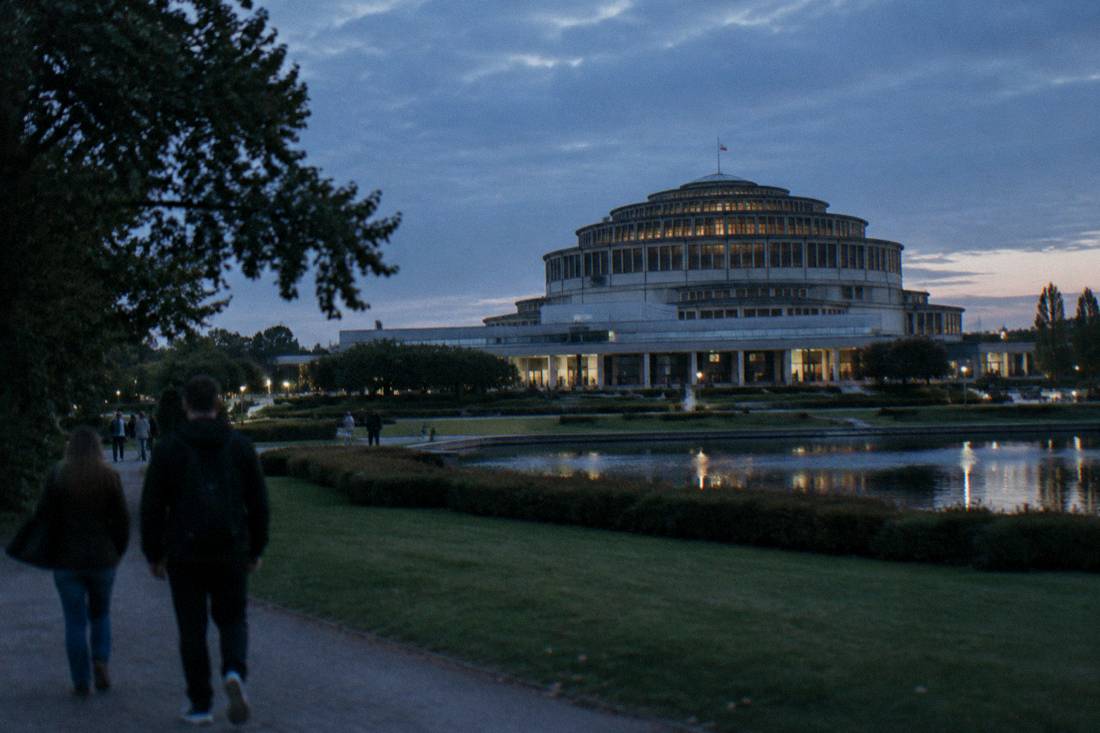 The exterior of Centennial Hall in Wroclaw surrounded by parkland