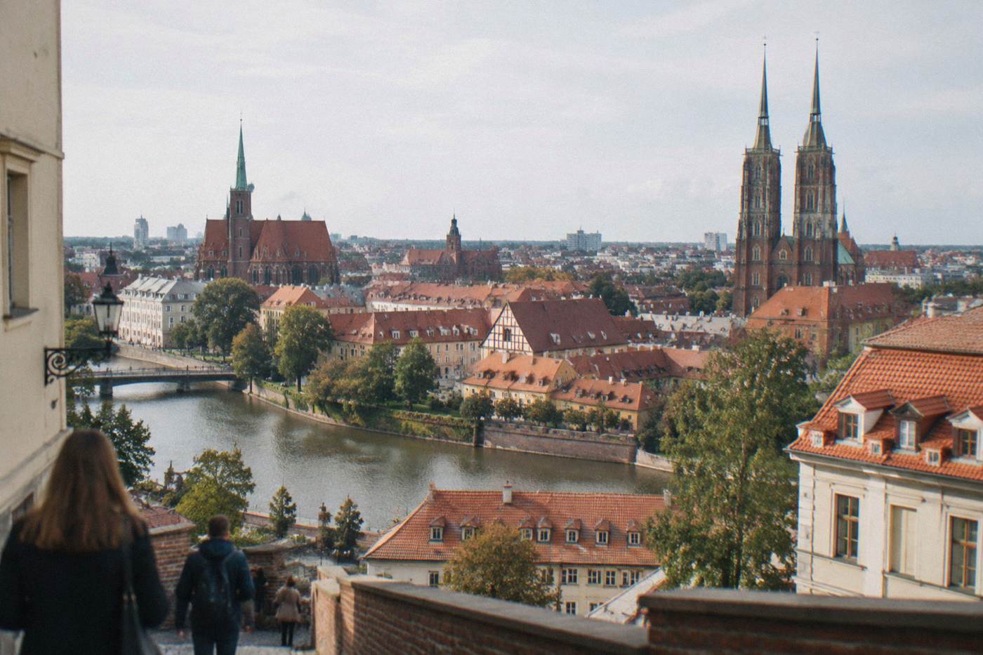 A view over the rooftops and church spires of Wroclaw's old center on a bright morning