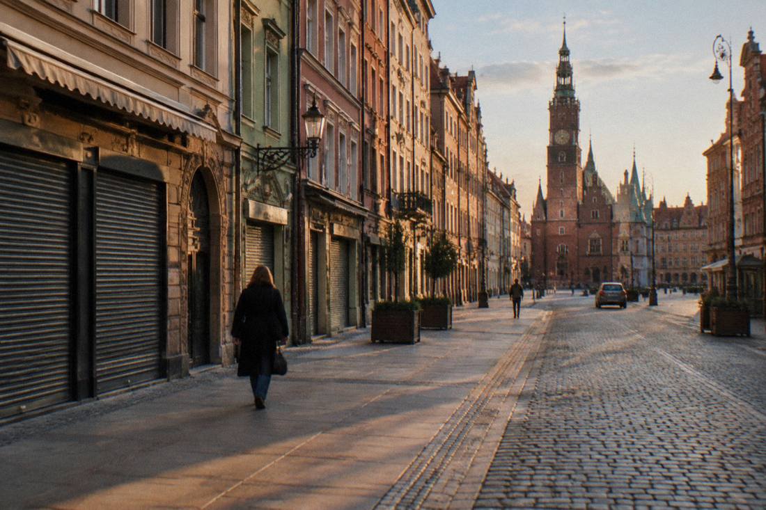 A city street in Wroclaw with shops shuttered and the walkways empty on a public holiday
