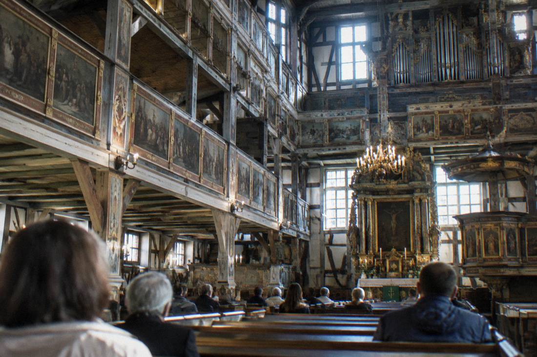 Interior of the timber-framed Church of Peace in Swidnica with painted galleries