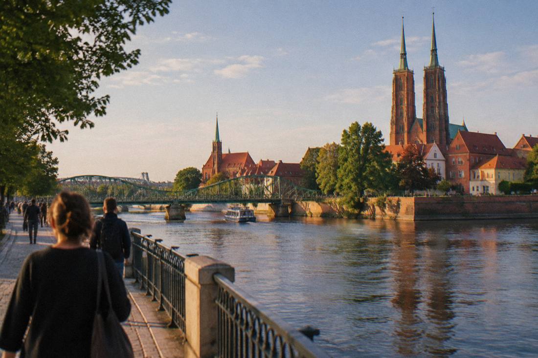 The Odra river and several bridges of Wroclaw's Cathedral Island on a bright day