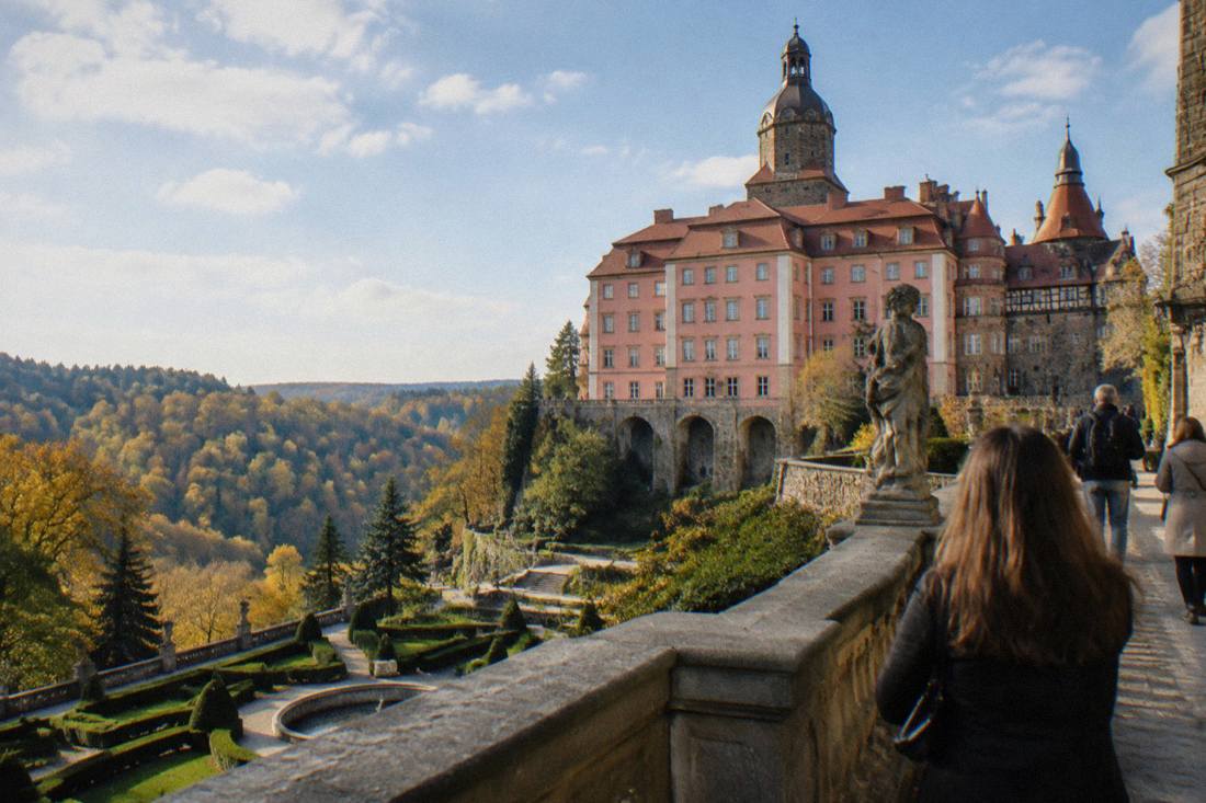 Ksiaz Castle seen from its terraces with gardens and forest beyond