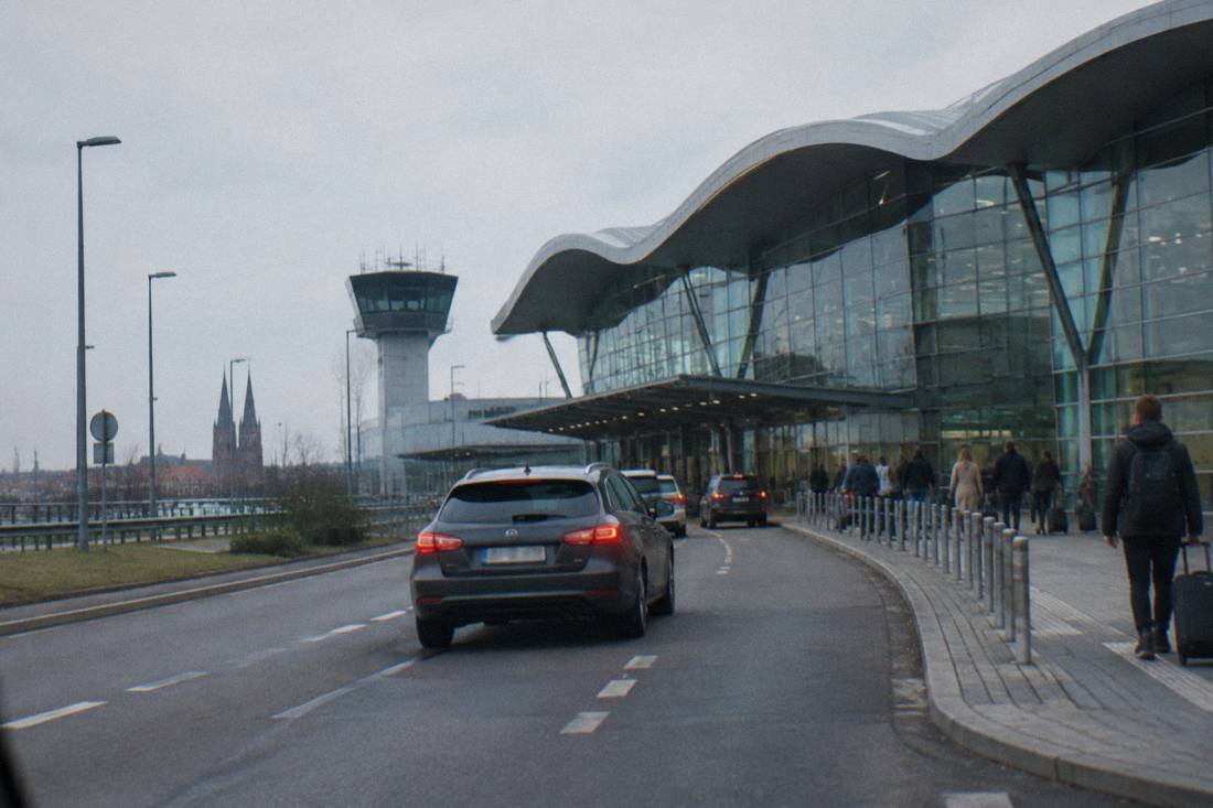 A car approaching the terminal building of Wroclaw Airport Copernicus