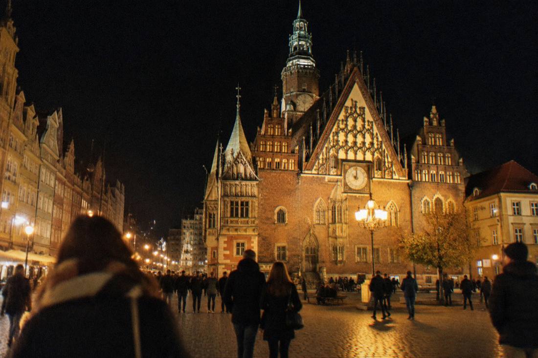 The illuminated Gothic town hall on Wroclaw's market square at night