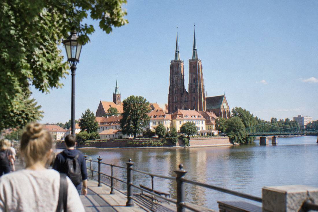The twin spires of the cathedral on Ostrow Tumski seen across the Odra river