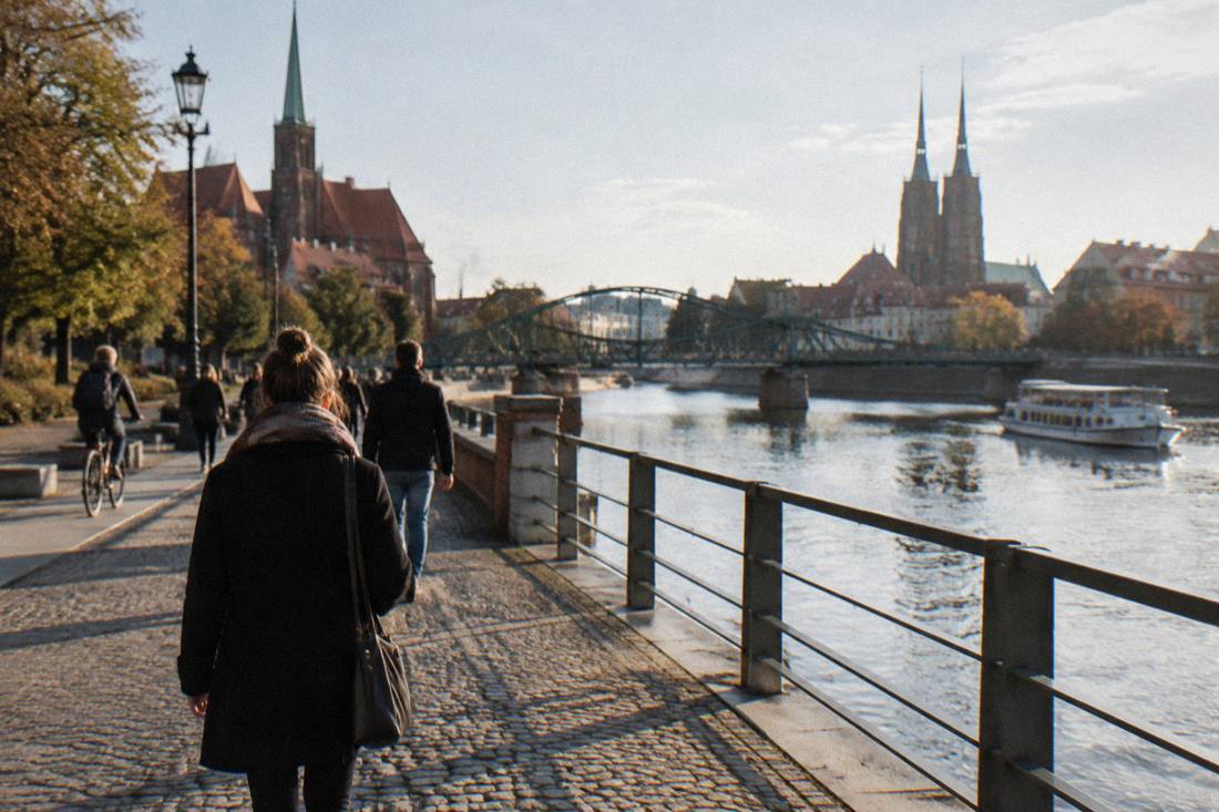 The riverside promenade along the Odra with bridges in the background