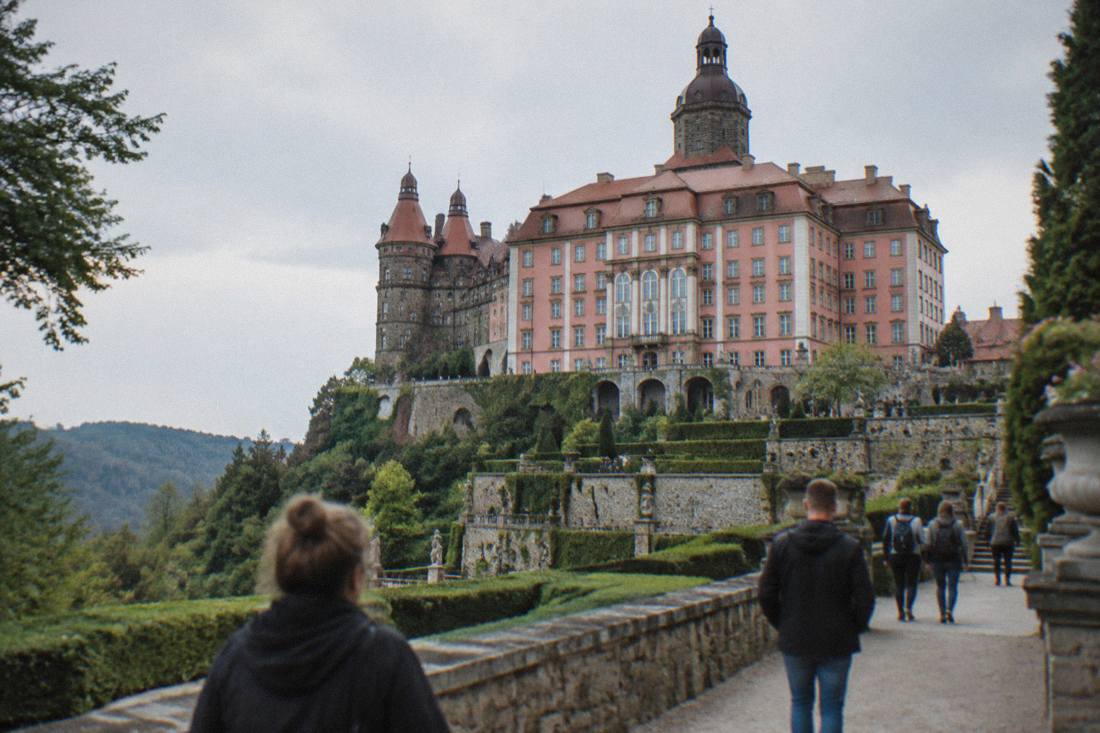 The baroque facade of Ksiaz Castle above its terraced gardens